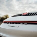 Logo Porsche 911 Carrera S Cabrio in Zürich