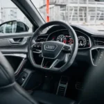 steering wheel view of the audi rs6 in zurich