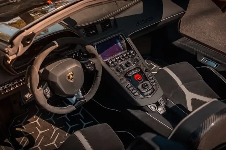 steering wheel view of the Lamborghini Aventador SVJ Roadster in Zurich