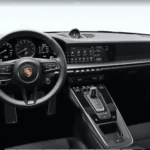 steering wheel view of the Porsche Carrera in Zurich