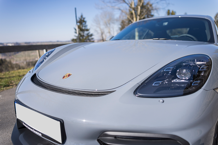 Front Porsche Cayman GT4 on Lake Constance
