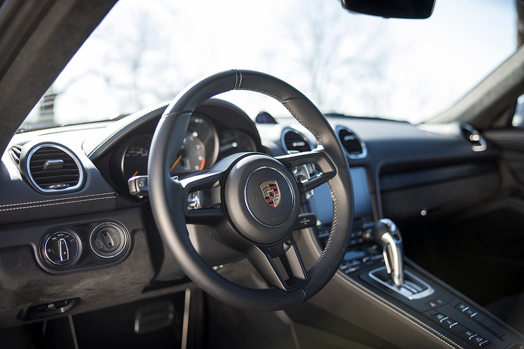 Steering Wheel Porsche Cayman GT4 on Lake Constance