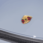 Logo front Porsche Cayman GT4 on Lake Constance